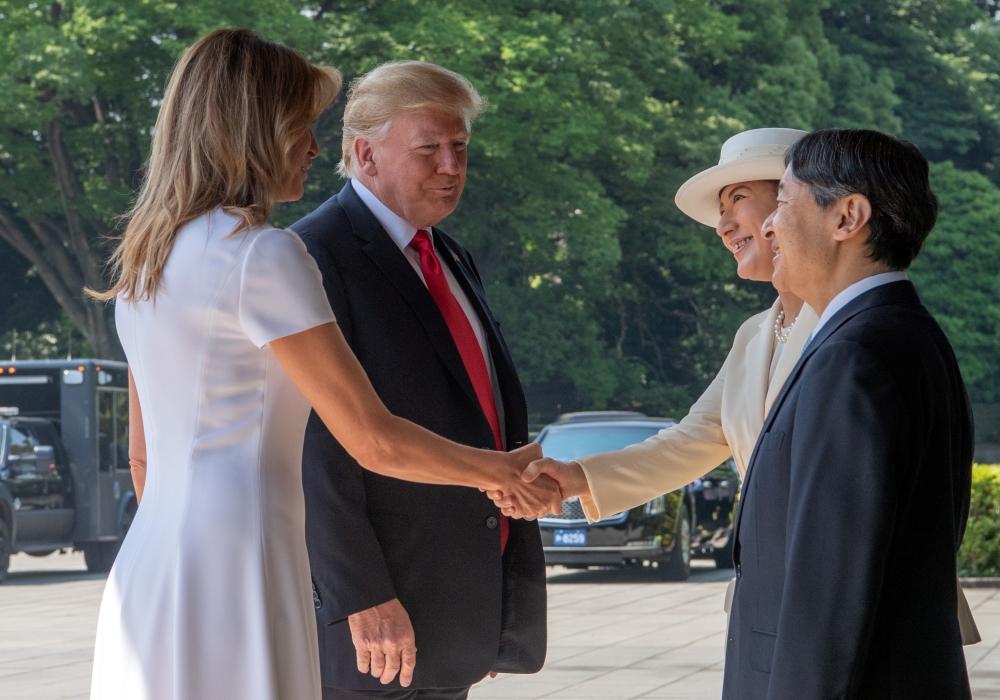 US President Donald J. Trump and First Lady Melania Trump are welcomed by Japan's Emperor Naruhito and Empress Masako upon their arrival at the Imperial Palace in Tokyo, Japan, May 27. — Reuters