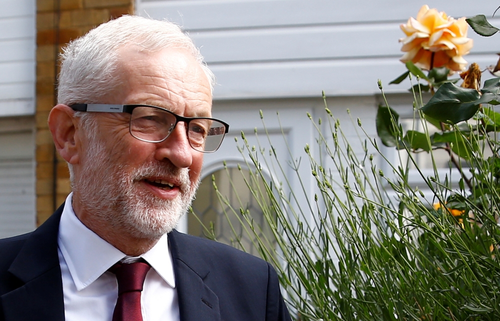 Britain's opposition Labour Party leader Jeremy Corbyn leaves his home, following the results of the European Parliament elections, in London, on Monday. — Reuters