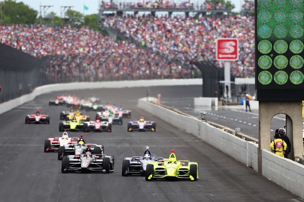 Simon Pagenaud of France, driver of the No. 22 Team Penske Chevrolet leads the field away at the start of the 103rd Indianapolis 500 at Indianapolis Motor Speedway on Sunday in Indianapolis, Indiana.  — AFP