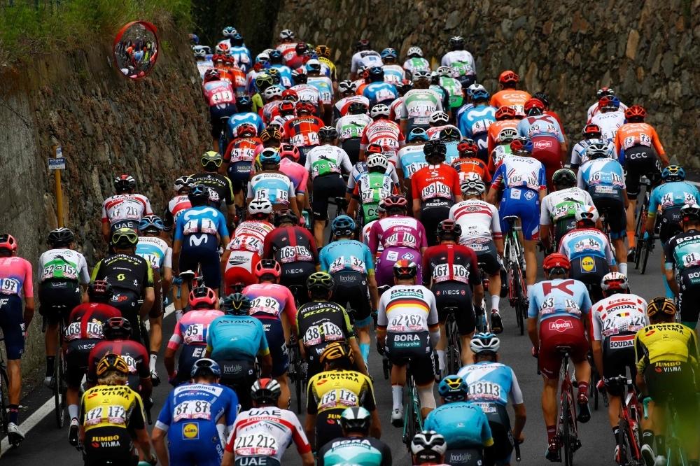 The pack rides during stage 15 of the 102nd Giro d'Italia - Tour of Italy - cycle race, from Ivrea to Como on Sunday.  — AFP