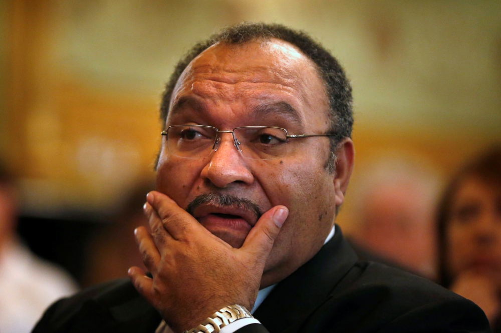 Papua New Guinea's  Prime Minister Peter O'Neill pauses before making an address to the Lowy Institute in Sydney, Australia. — Reuters