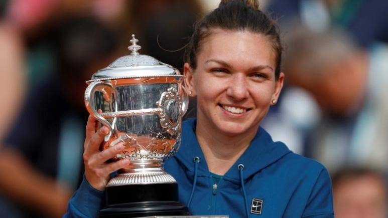Romania’s Simona Halep celebrates with the trophy after winning the final against Sloane Stephens of the at the Roland Garros, Paris in this June 9, 2018 file photo. — Reuters