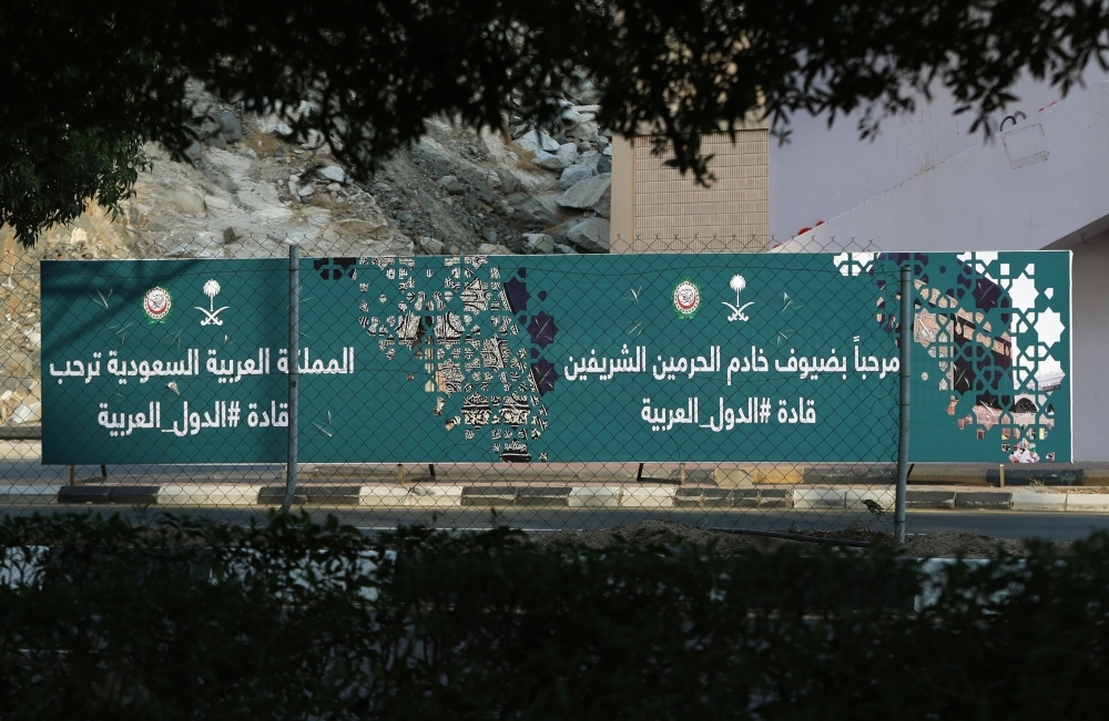 Flags from different countries are pictured in Makkah ahead of the upcoming summits of the Arab League, the Gulf Cooperation Council and OIC. — AFP