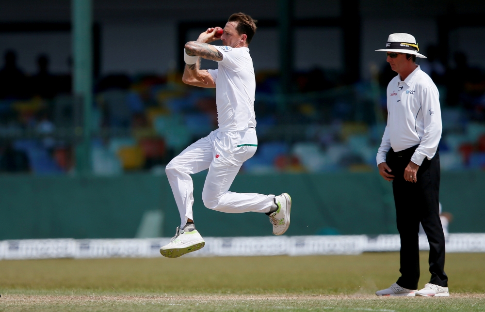 South Africa's Dale Steyn (L) bowls next to umpire Rod Tucker during the Second Test Match against Sri Lanka at Colombo, Sri Lanka, in this file phboto. — Reuters 