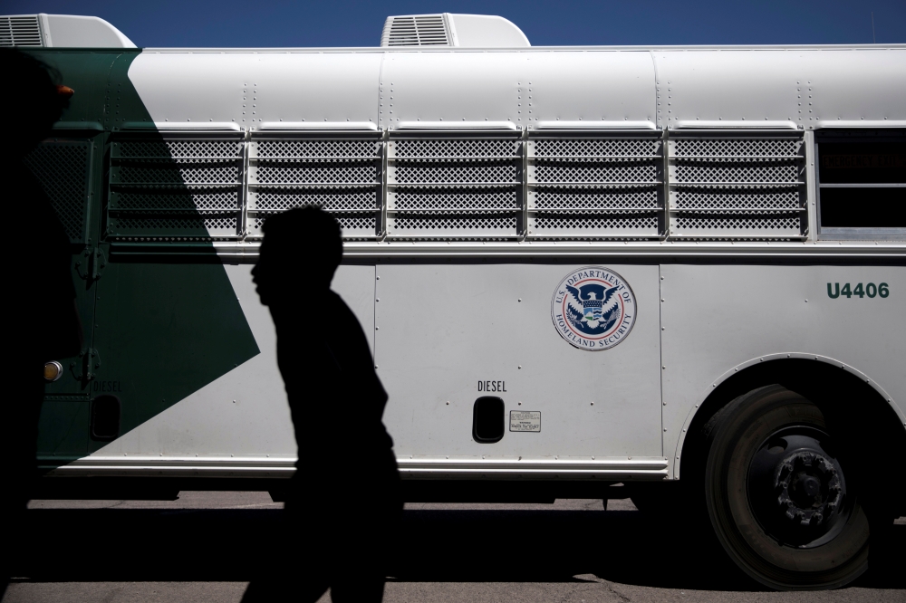 A migrant child disembarks a US Border Patrol bus at the processing center and shelter in Deming, New Mexico, US on Monday. — Reuters