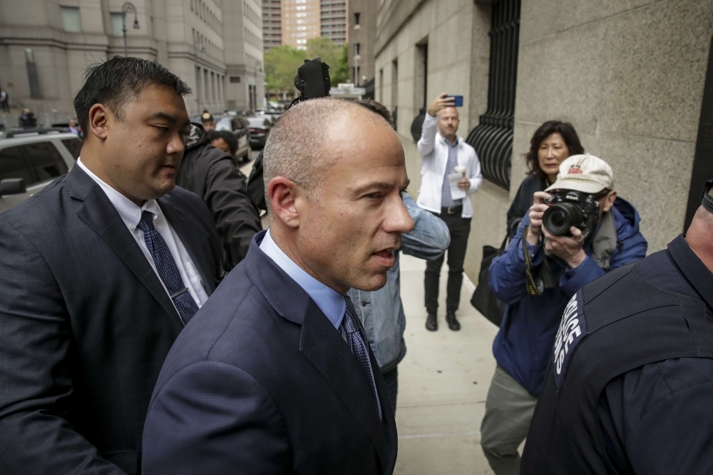 Attorney Michael Avenatti leaves federal court between arraignments in Manhattan, Tuesday in New York City. Avenatti was arraigned on charges that he stole nearly $300,000 from adult film actress Stormy Daniels. Later, he will attend another arraignment on charges that he tried to extort up to $25 million Nike. — AFP