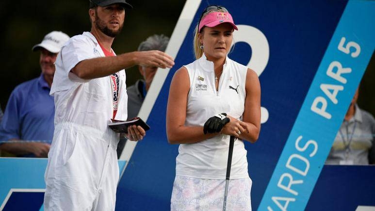 Lexi Thompson talks with her caddy Benji Thompson on the second hole tee box during the first round of the ANA Inspiration golf tournament at Mission Hills CC - Dinah Shore Tournament Course, in this Apr 4, 2019, file photo. — Reuters