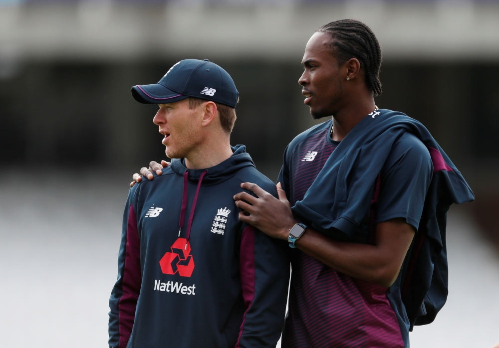 England's Jofra Archer talks with Eoin Morgan during nets prior to the ICC Cricket World Cup clash at the Kia Oval, London, Britain, on  Wednesday. — Reuters