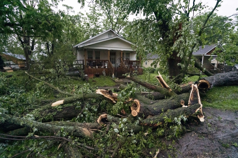 A tornado toppled trees and power lines in much of the city of Linwood on Tuesday in Linwood, Kansas. The Midwest has seen extensive severe weather this spring with widespread flooding and multiple tornadoes. — AFP