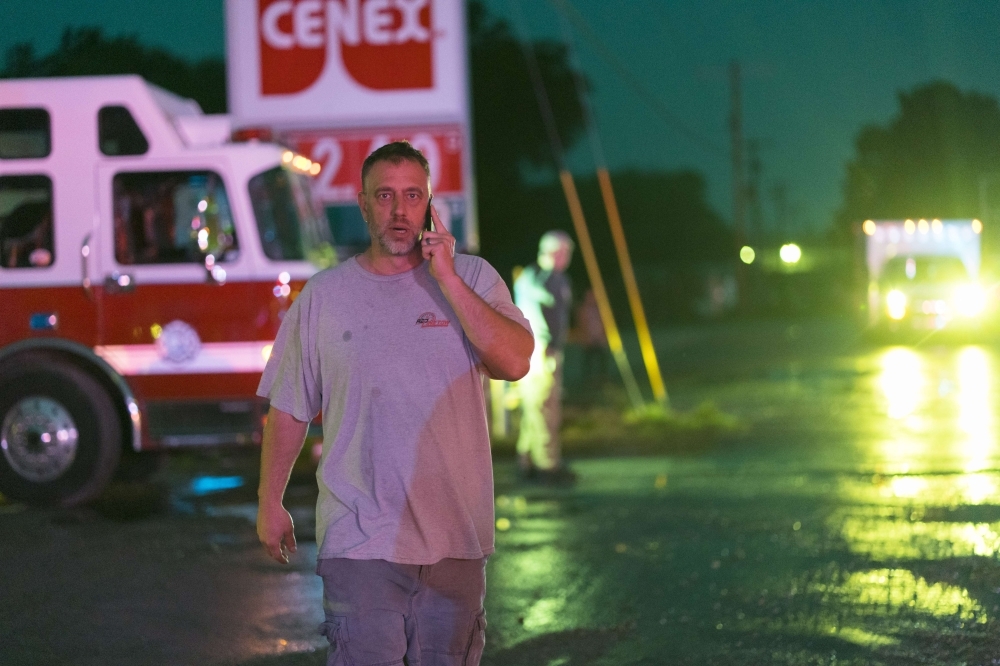 A tornado toppled trees and power lines in much of the city of Linwood on Tuesday in Linwood, Kansas. The Midwest has seen extensive severe weather this spring with widespread flooding and multiple tornadoes. — AFP