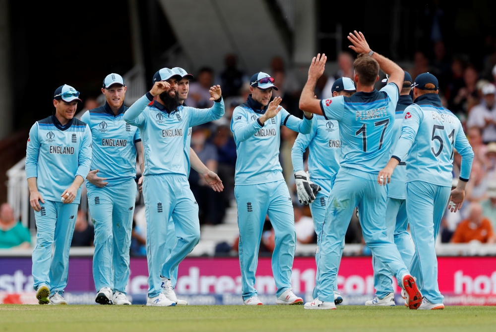 England's Liam Plunkett celebrates with Joe Root after taking the wicket of South Africa's Quinton de Kock during the ICC Cricket World Cup match at the Kia Oval, London, Britain, Thursday. —  Reuters