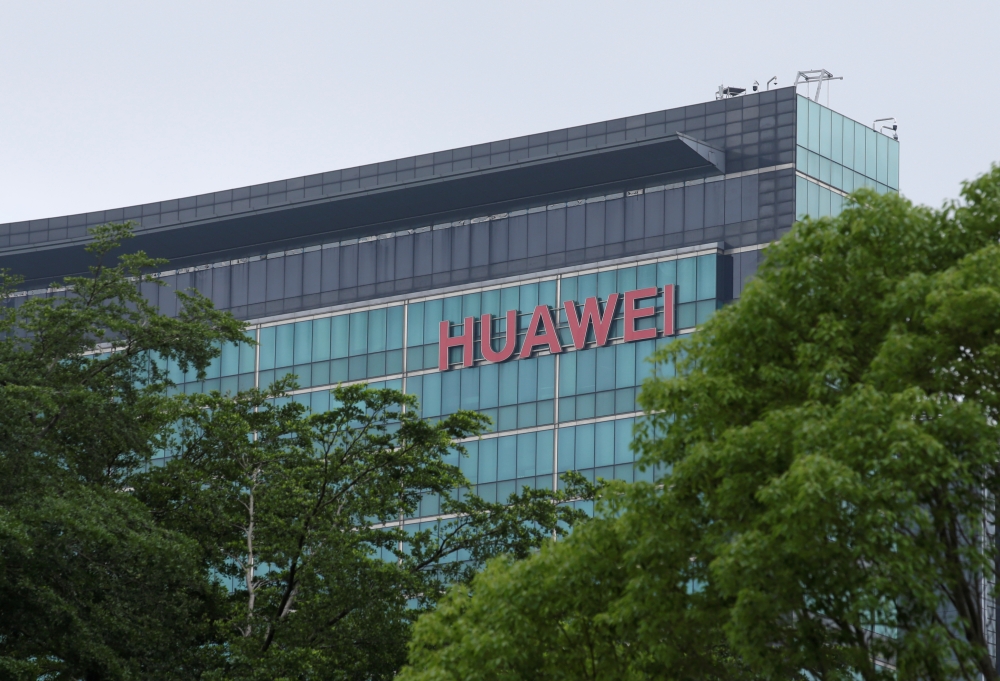 A Huawei logo is seen on the side of a building at the headquarters in Shenzhen, Guangdong province, China. — Reuters