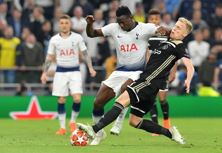 Tottenham Hotspur's Kenyan midfielder Victor Wanyama tackles Ajax midfielder Donny van de Beek in this file photo. — AFP