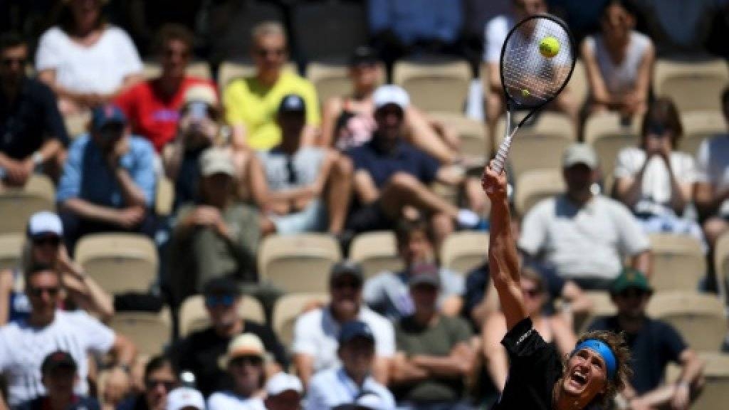 Alexander Zverev serves the ball to Dusan Lajovic during his victory on Saturday. — AFP 