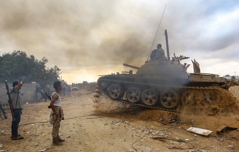 Fighters loyal to the Libyan Government of National Accord (GNA) are pictured near the front-line during clashes against forces loyal to strongman Khalifa Haftar, in Al-Sawani area, south of the Libyan capital Tripoli, on Saturday. — AFP