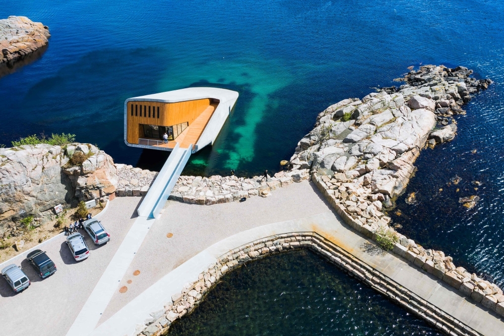 An aerial view of Under, a restaurant that is semi-submerged beneath the waters of the North Sea in Lindesnes near Kristiansand, some 400 km south west of Oslo, in this May 2, 2019 file photo. — AFP