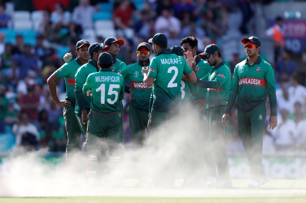 Bangladesh players celebrate the wicket of South Africa's David Miller during the ICC Cricket World Cup match at the Kia Oval, London, Britain, on Sunday. — Reuters