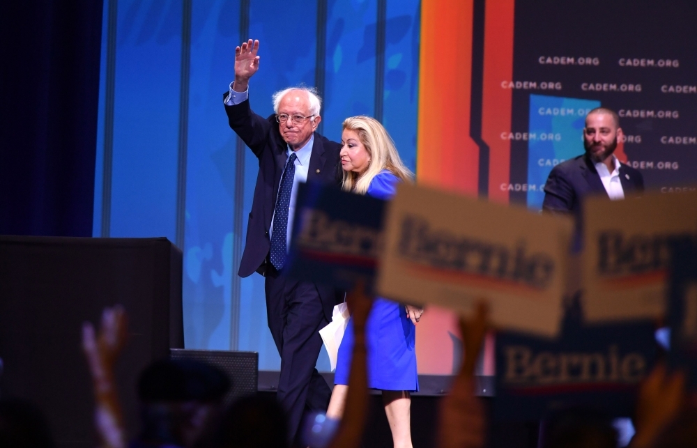 Democratic presidential candidate Bernie Sanders leaves the stage during the 2019 California Democratic Party State Convention at Moscone Center in San Francisco, California, on Sunday. — AFP