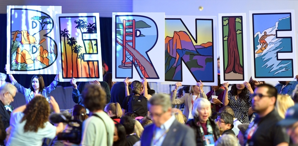 Democratic presidential candidate Bernie Sanders leaves the stage during the 2019 California Democratic Party State Convention at Moscone Center in San Francisco, California, on Sunday. — AFP