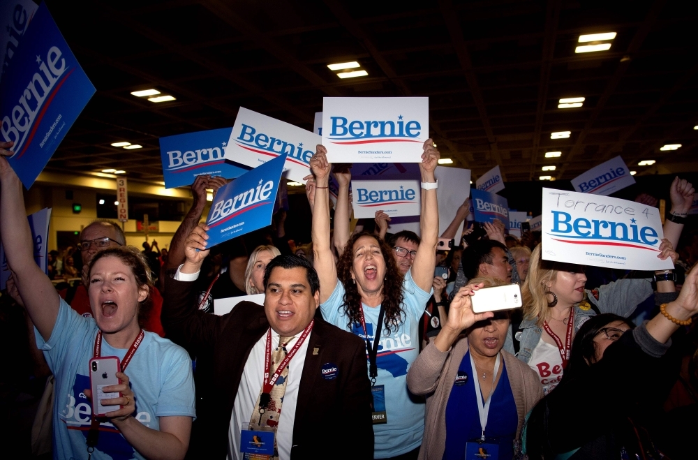 Democratic presidential candidate Bernie Sanders leaves the stage during the 2019 California Democratic Party State Convention at Moscone Center in San Francisco, California, on Sunday. — AFP