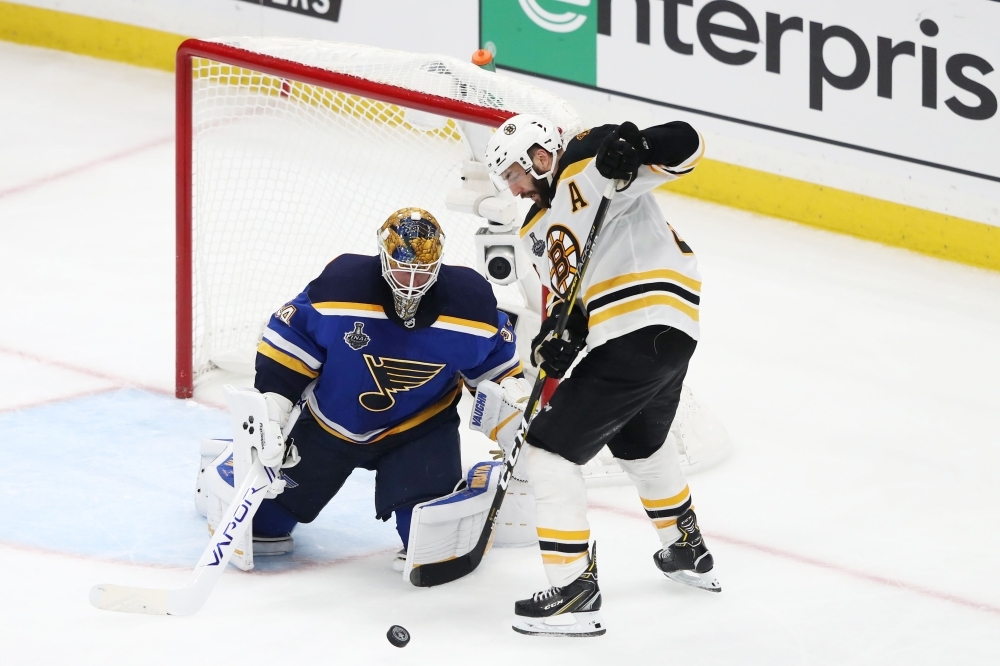 Jake Allen #34 of the St. Louis Blues tends net against Patrice Bergeron #37 of the Boston Bruins during the third period in Game Three of the 2019 NHL Stanley Cup Final at Enterprise Center  in St Louis, Missouri, on Saturday. — AFP