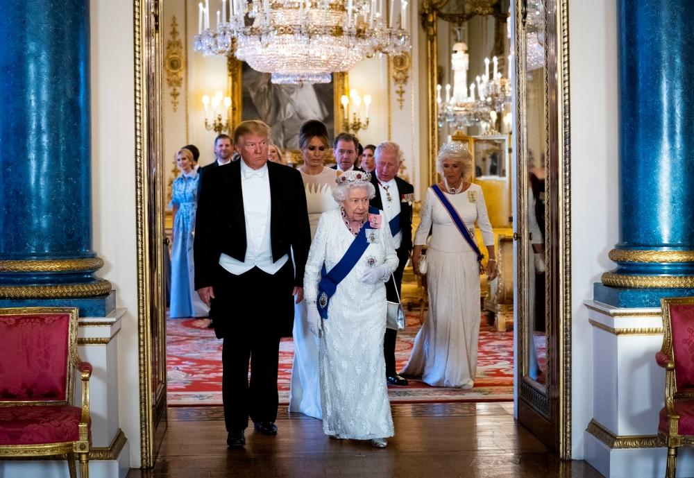 US President Donald Trump, First Lady Melania Trump, Britain's Queen Elizabeth, Britain's Charles, the Prince of Wales and Camilla, Duchess of Cornwall are seen at the State Banquet at Buckingham Palace in London, Britain, Monday. — Reuters