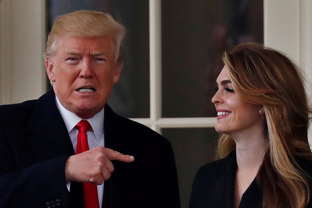 US President Donald Trump and former White House Communications Director Hope Hicks outside the Oval Office in Washington in this March 29, 2018 file photo. — Reuters