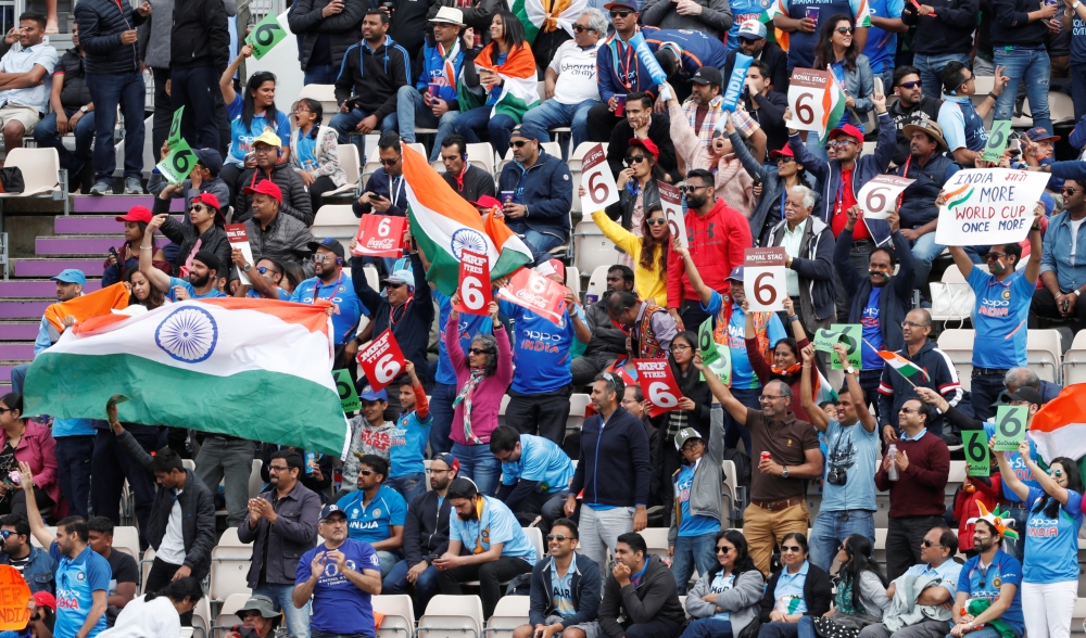 India fans cheer their side against South Africa during the ICC Cricket World Cup match at The Ageas Bowl, Southampton, Britain, on Wednesday. — Reuters