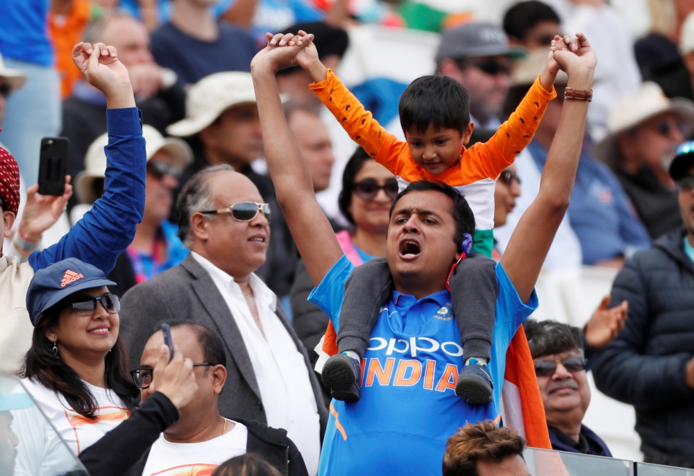 India fans cheer their side against South Africa during the ICC Cricket World Cup match at The Ageas Bowl, Southampton, Britain, on Wednesday. — Reuters