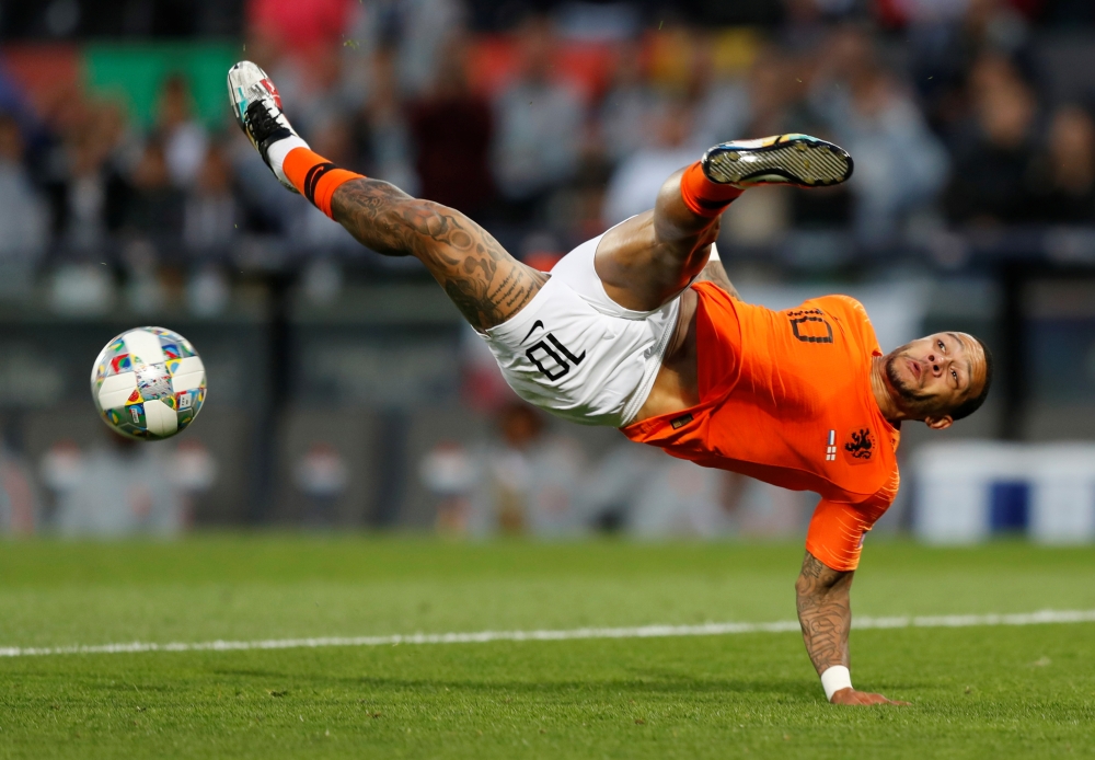Dutch forward Memphis Depay kicks the ball during the UEFA Nations League semi-final football match between The Netherlands and England at the Afonso Henriques Stadium in Guimaraes, Portugal, on Thursday. — Reuters