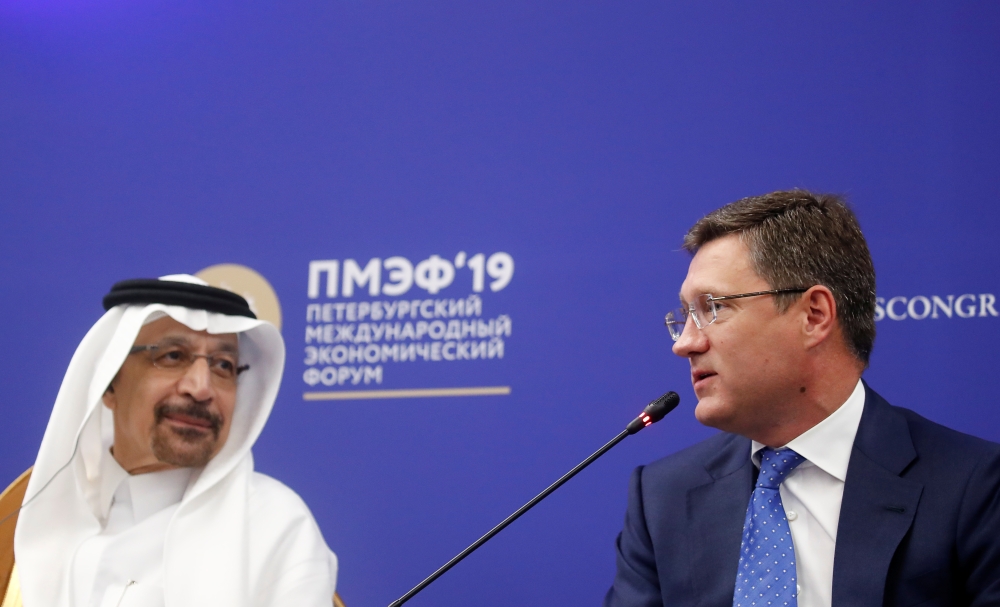 Russian Energy Minister Alexander Novak (R) and Saudi Minister of Energy, Industry and Mineral Resources Khalid Al-Falih attend a session of the St. Petersburg International Economic Forum (SPIEF), Russia Friday. — Reuters