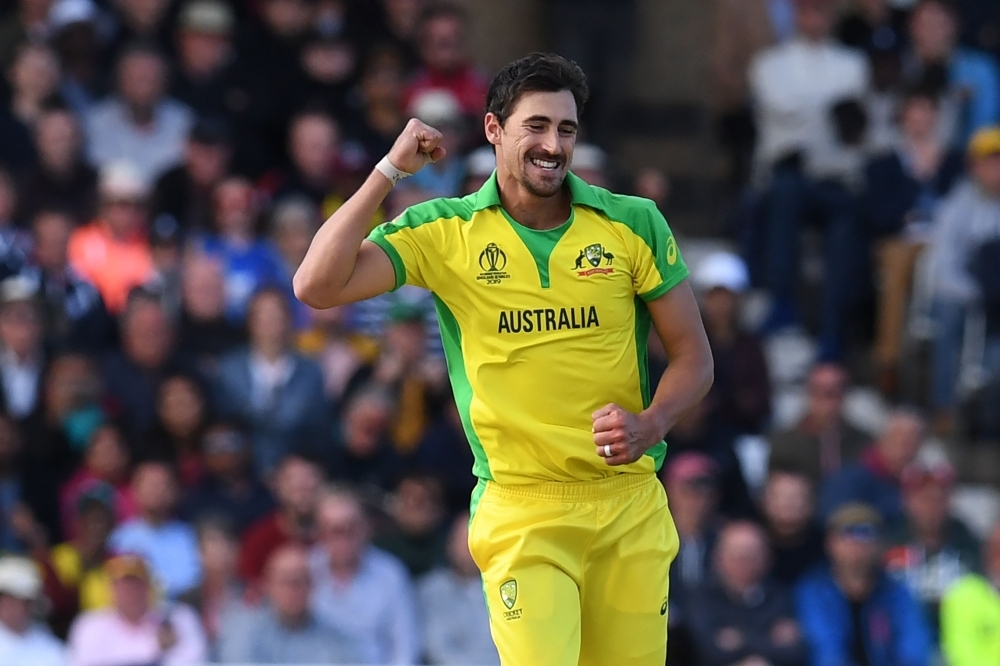 Australia's Mitchell Starc celebrates after taking his fifth wicket, that of West Indies' Sheldon Cottrell during the 2019 Cricket World Cup group stage match between Australia and West Indies at Trent Bridge in Nottingham, central England, on Thursday. Australia beat West Indies by 15 runs. — AFP