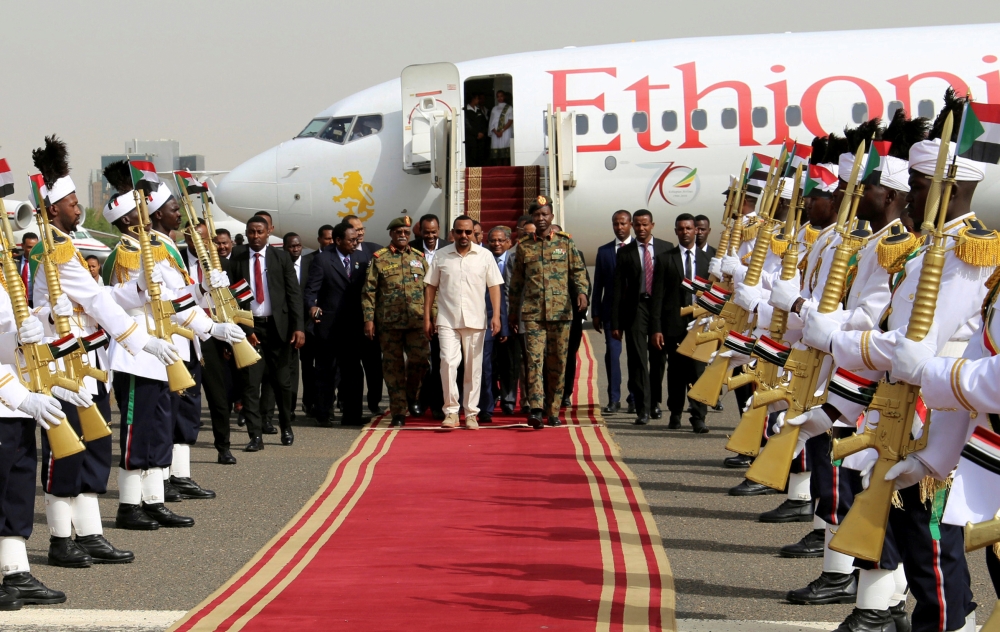 Ethiopian Prime Minister Abiy Ahmed arrives at Khartoum airport on Friday. — Reuters