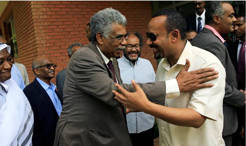 Ethiopian Prime Minister Abiy Ahmed (right) meets members of Sudan's opposition alliance to mediate in its political crisis at the Ethiopian Embassy in Khartoum, Friday. — Reuters