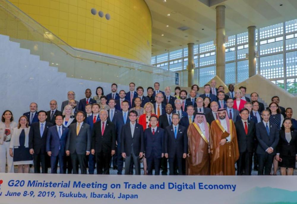 Minister of Communications and Information Technology Abdullah Al-Sawaha stands for a group photo at a gathering of G20 ministers in Osaka, Japan, on Saturday. — SPA