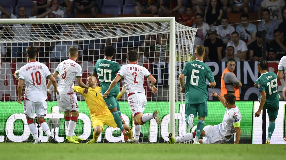 Germany's midfielder Leroy Sane (R) scores the opening goal during the Euro 2020 football qualification match between Belarus and Germany in Borisov outside Minsk on Saturday. — AFP