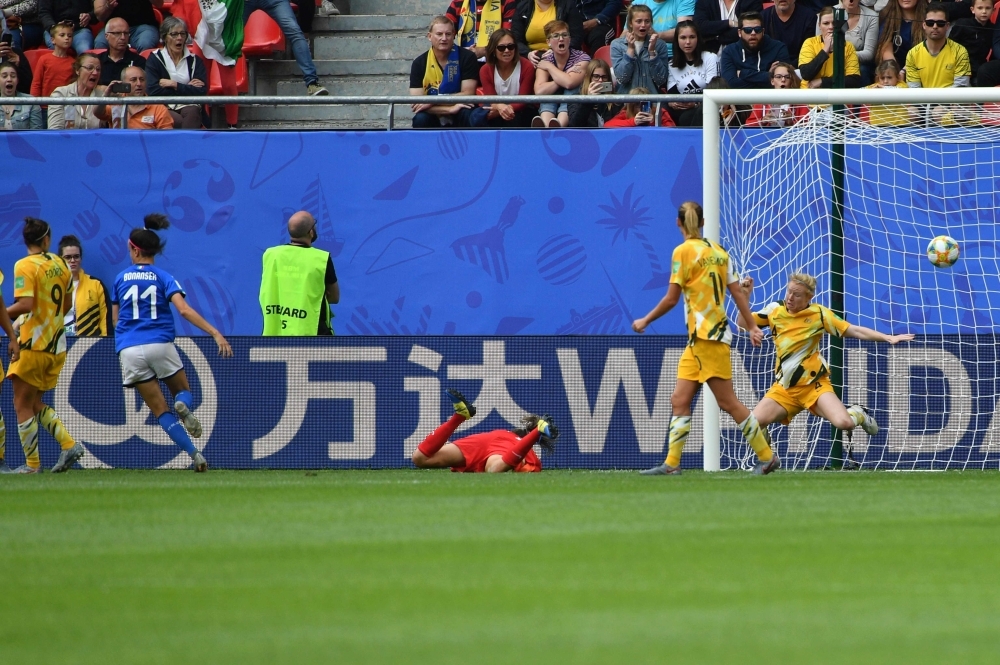 Italy's midfielder Barbara Bonansea (C) celebrates her team's victory at the end of the France 2019 Women's World Cup Group C football match between Australia and Italy, on Sunday, at the Hainaut Stadium in Valenciennes, northern France. — AFP