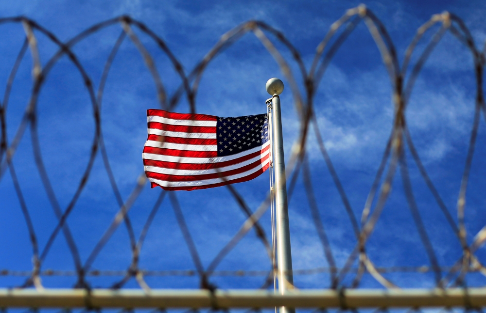 The US flag flies over Camp VI, a prison used to house detainees at the US Naval Base at Guantanamo Bay, in this March 5, 2013 file photo. — Reuters