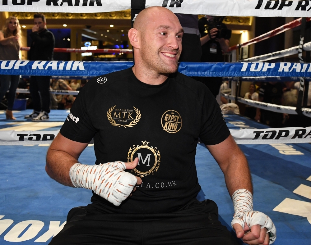 Boxer Tyson Fury is interviewed after working out at MGM Grand Hotel & Casino on Tuesday in Las Vegas, Nevada. Fury will face Tom Schwarz in a heavyweight bout on June 15 at MGM Grand Garden Arena in Las Vegas. — AFP