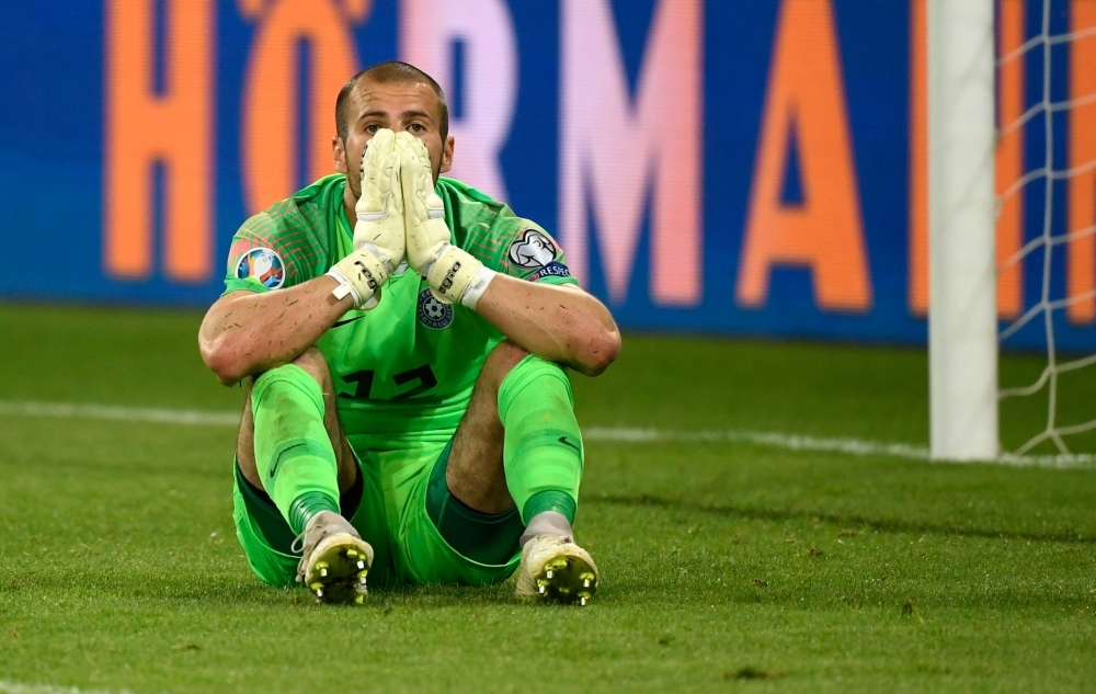 Estonia's goalkeeper Sergei Lepmets reacts during the UEFA Euro 2020 qualifier Group C football match Germany against Estonia on Tuesday in Mainz. — AFP