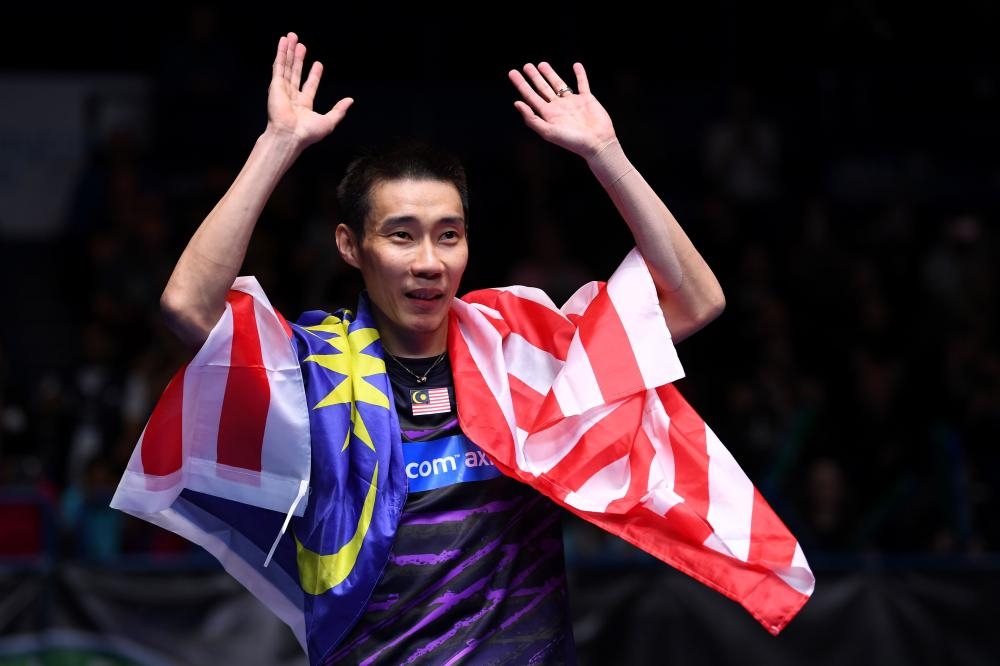 In this file photo, Malaysia's Lee Chong Wei celebrates his victory over China's Lin Dan in their All England Open Badminton Championships men's singles final match in Birmingham, central England. — AFP