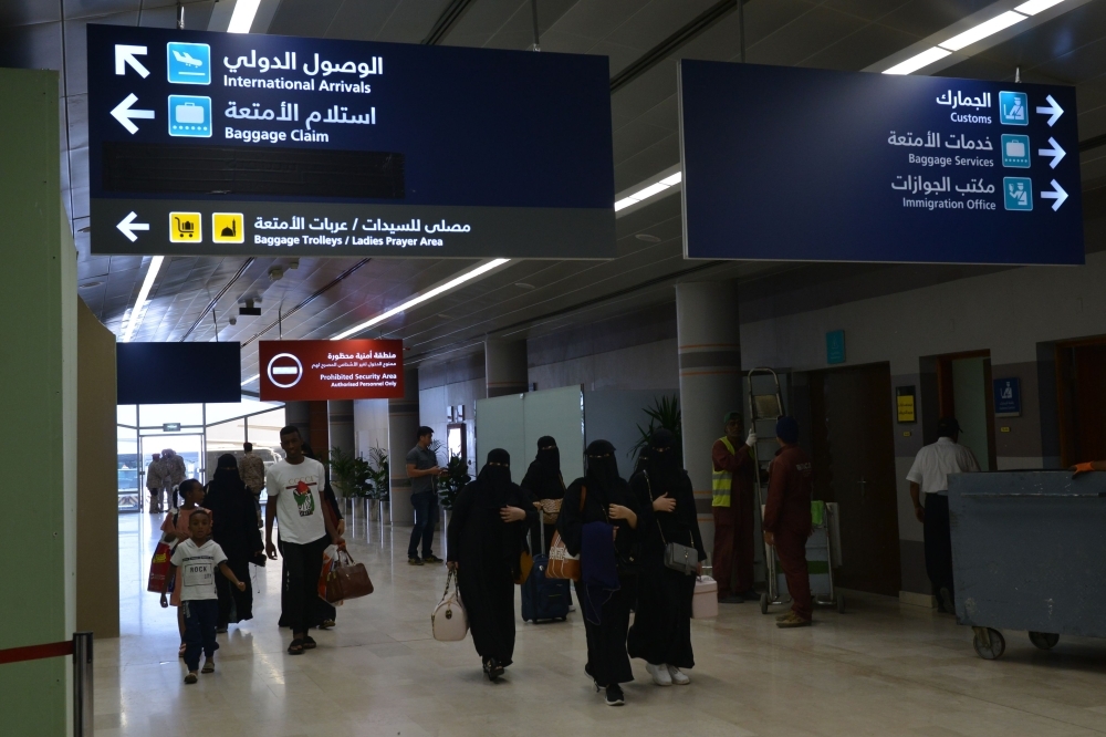 Saudi women arriving at Abha airport which is operating normally . — AFP