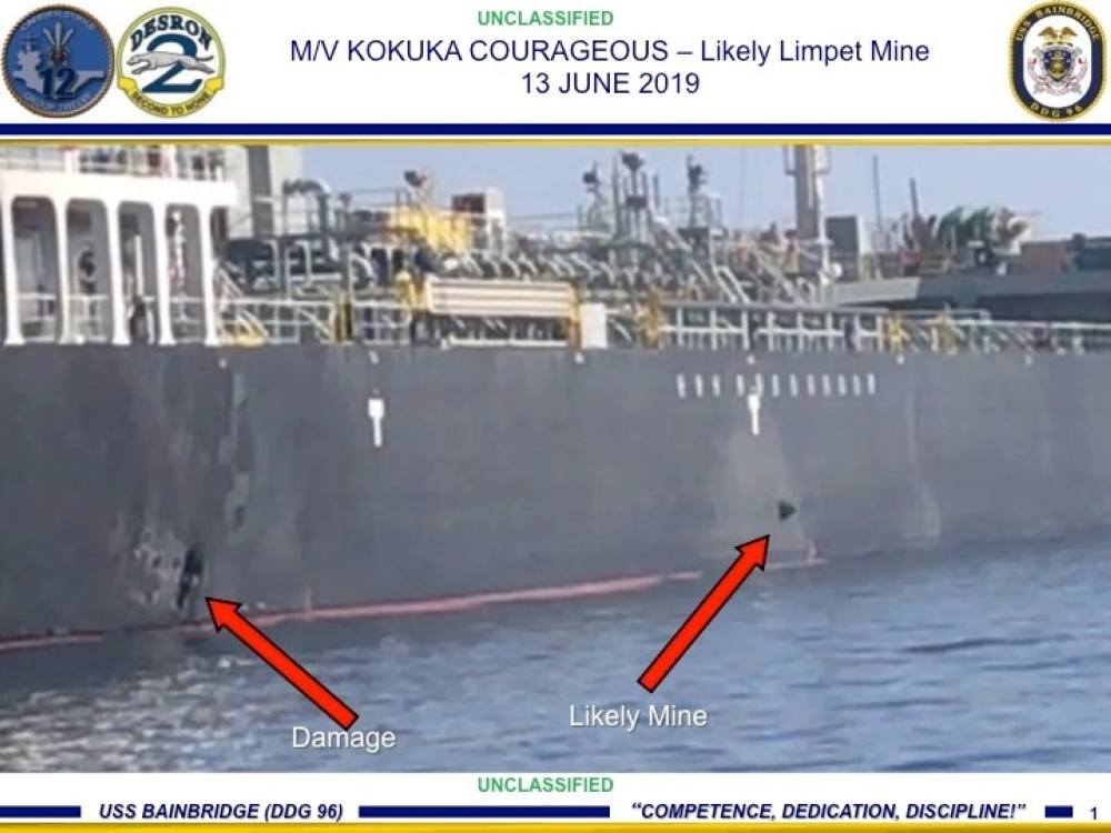 A picture released by US Central Command shows damage from an explosion (L) and a likely limpet mine, on the hull of the civilian vessel M/V Kokuka Courageous in the Gulf of Oman in the Arabian Sea. — Reuters