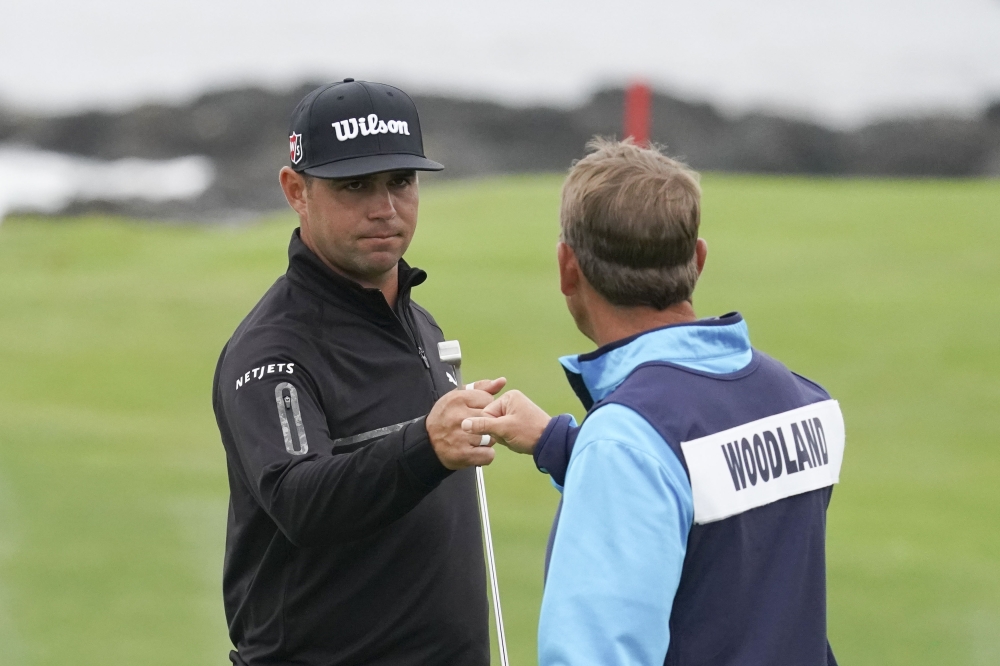 Gary Woodland hits a chip shot on the eighth hole during the second round of the 2019 US Open golf tournament at Pebble Beach Golf Links. — Reuters