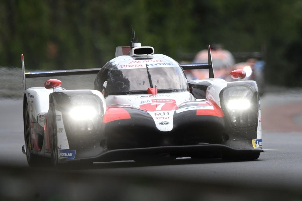 Japan's driver Kamui Kobayashi steers his Toyota TS050 Hybrid LMP1 during the 87th edition of the Le Mans 24 Hours endurance race, in Le Mans, northwestern France, on Saturday. — AFP