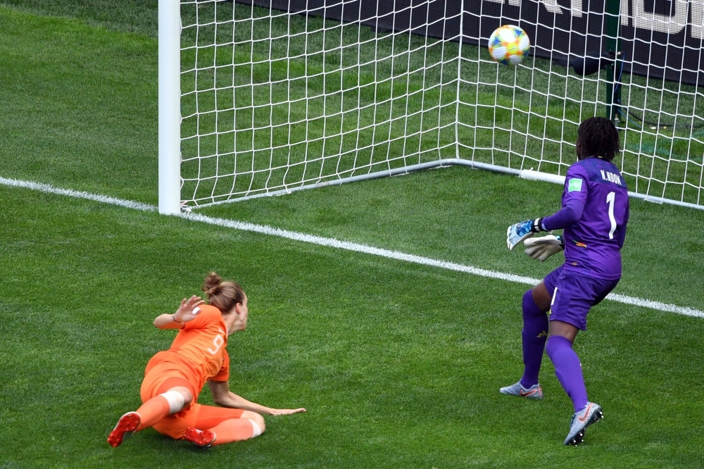 Netherlands' Vivianne Miedema celebrates scoring their third goal against Cameroon with Jill Roord, Lieke Martens and teammates during the France 2019 Women's World Cup Group E football match on Saturday at the Hainaut Stadium in Valenciennes, northern France. — Reuters