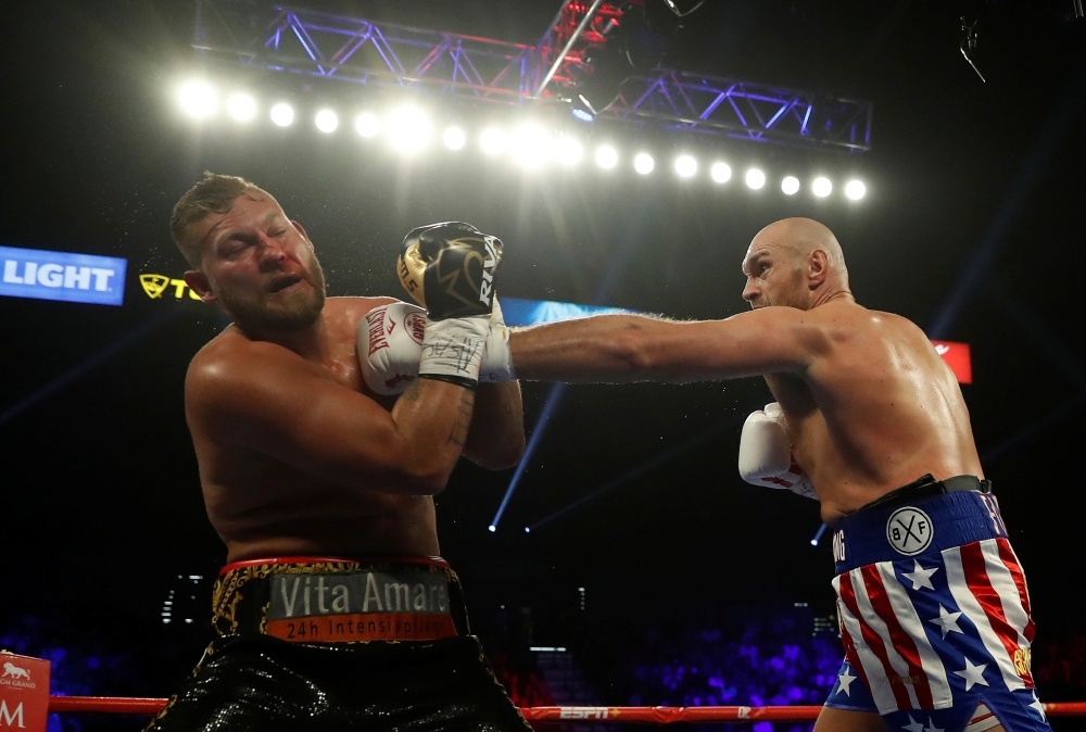 Tyson Fury and Tom Schwarz in action during the Heavyweight Fight at the MGM Grand Arena, Las Vegas, United States on Saturday. — Reuters