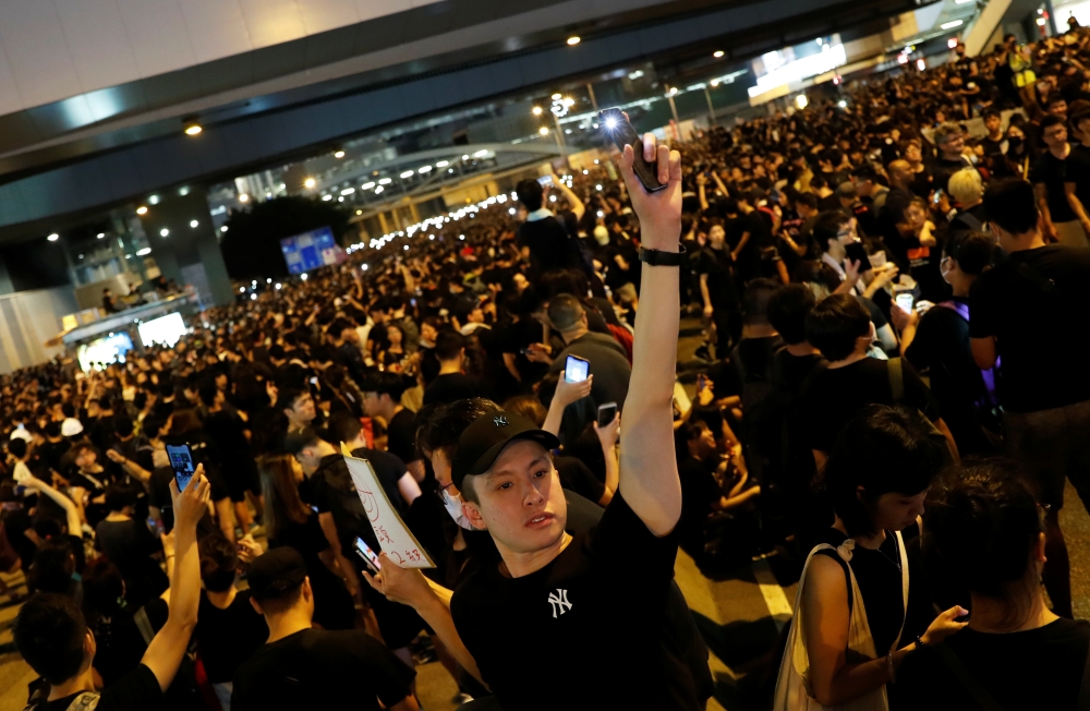 Protesters attend a demonstration demanding Hong Kong's leaders to step down and withdraw the extradition bill, in Hong Kong, China, June 16, 2019.  — Reuters