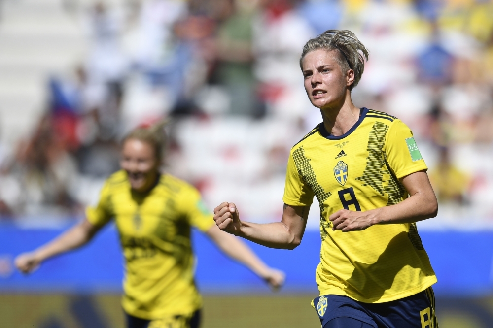 Sweden's midfielder Lina Hurtig (R) celebrates after scoring a goal during the France 2019 Women's World Cup Group F football match against Thailand, on Sunday, at the Nice Stadium in Nice, southeastern France. — AFP