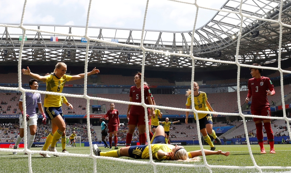 Sweden's midfielder Lina Hurtig (R) celebrates after scoring a goal during the France 2019 Women's World Cup Group F football match against Thailand, on Sunday, at the Nice Stadium in Nice, southeastern France. — AFP